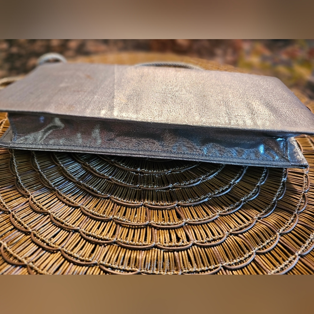 Beautiful silver clutch with rhinestones on the side. Used - Picture 7 of 9